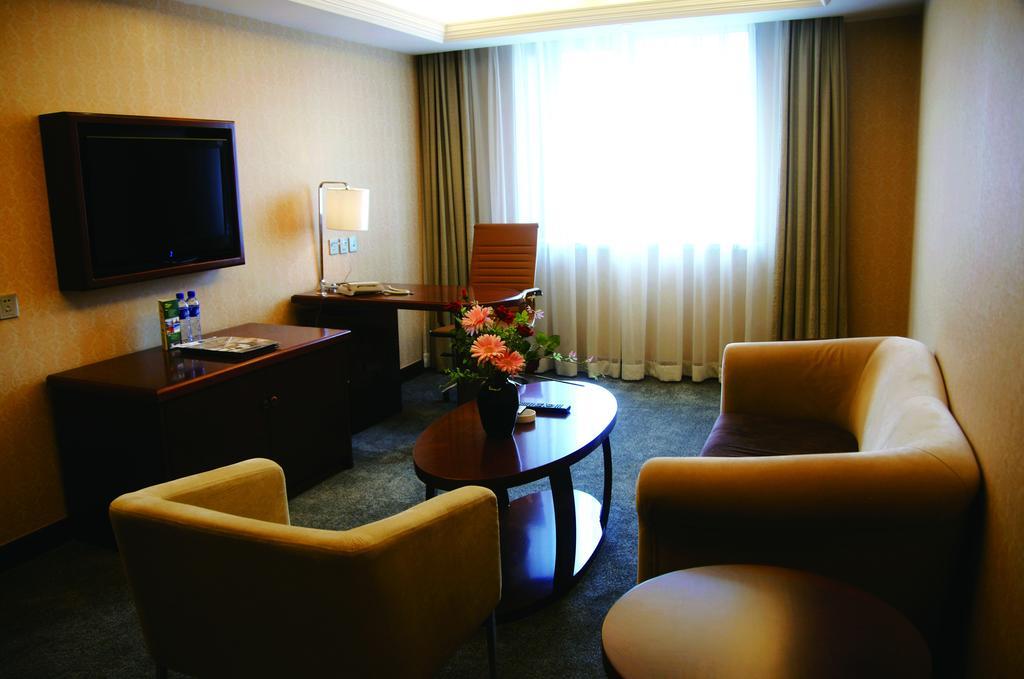 New Gloria Plaza Garden Hotel ฮาร์บิน ภายนอก รูปภาพ