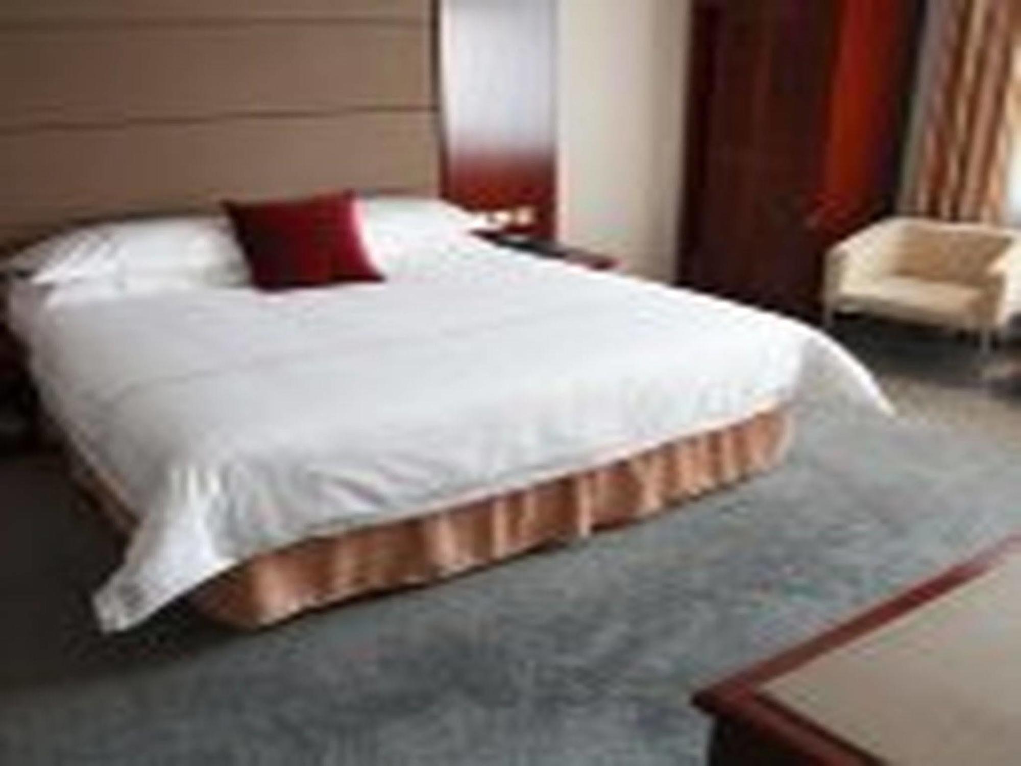 New Gloria Plaza Garden Hotel ฮาร์บิน ภายนอก รูปภาพ